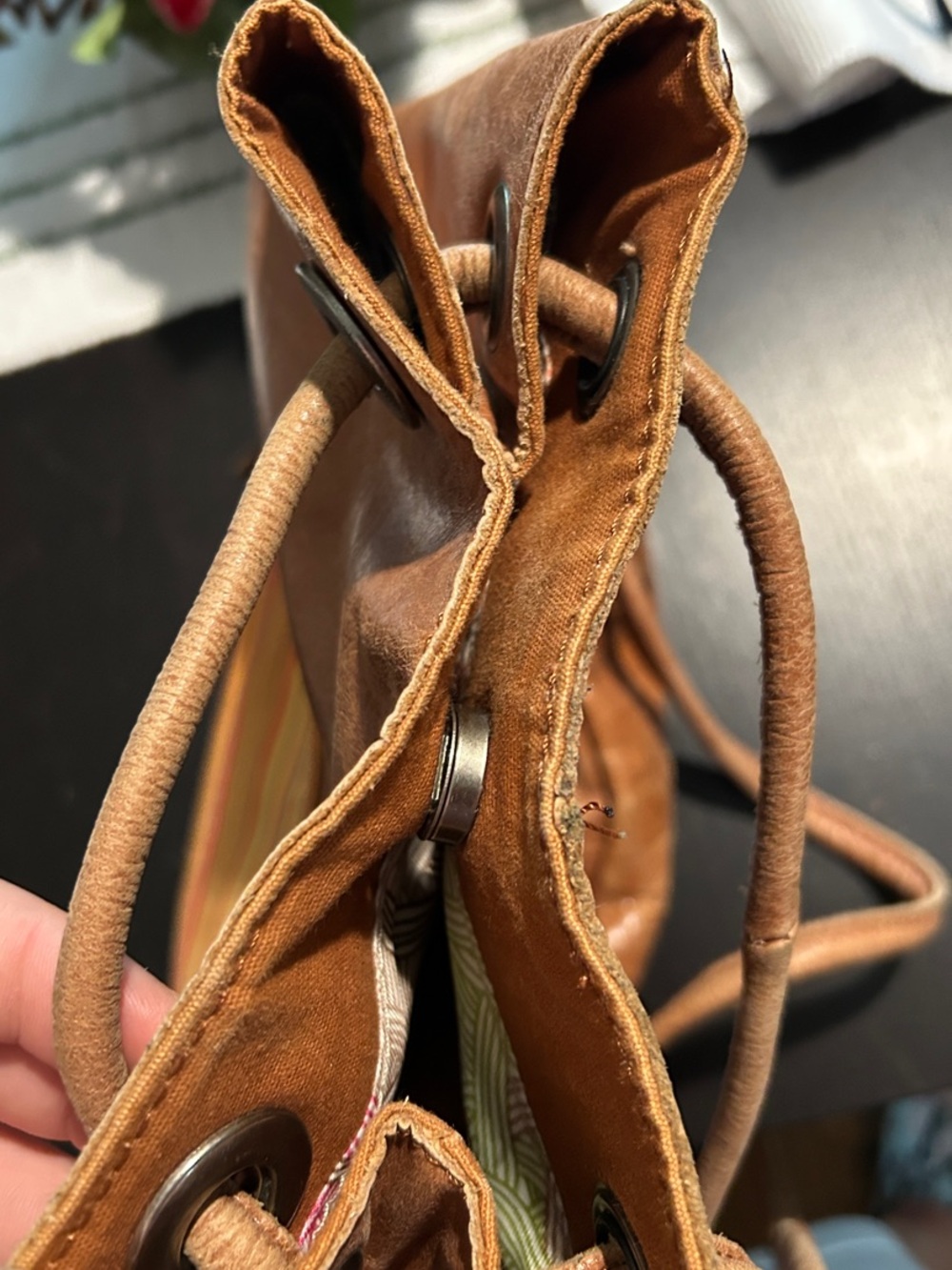 The Sak Brown Leather Drawstring Shoulder Bag with Orange Accents - Picture 6 of 9